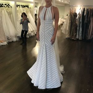 Stunning one time worn Valentini Spose handmade wedding gown.